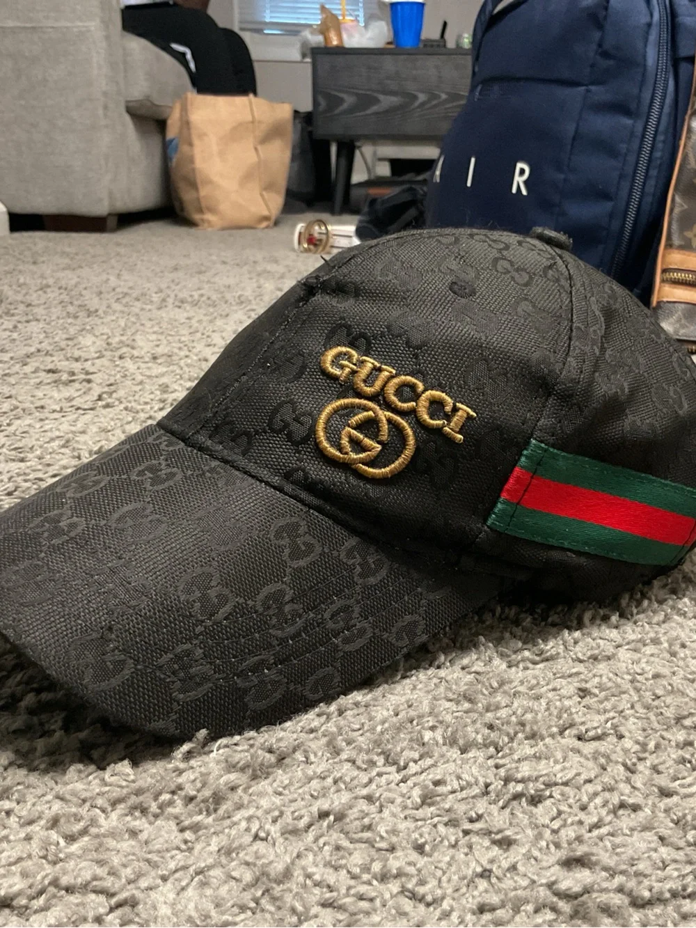 Gucci Black Cap with Gold Logo and Green-Red Web